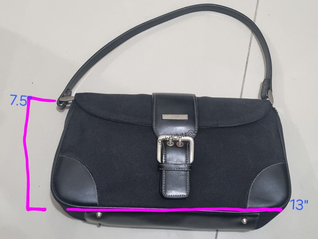 Buy 1 take 1 Kili bag (Category: Shoulder Bags) located in Quezon City. Submitted by gabdclutz (Listing ID 1465692099, Image 3). Description: FOR REFERENCE: MODEL HEIGHT 5'0 - Bag 1: Black canvas with leather trim, 13" x 7.5" with front buckle closure - Bag 2: Off-white leather, 15" x 9" with two front pockets and braided strap - Both ideal for daily use and errands - Clean interiors with smooth, fully functional zippers and closures METRO MANILA
