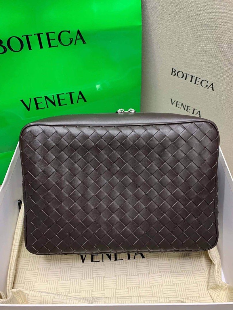 BV Intrecciato Leather Messenger Bag (Category: Luxury Bags & Wallets) located in Manila. Submitted by bagsandmanymanymore1 (Listing ID 1465599662, Image 2). Description: - Authentic BV messenger bag leather -Size 35cm - Features iconic intrecciato weave pattern on the base and bottom section - Secure zip closure with signature triangle zipper pulls - Adjustable leather shoulder strap with durable metal hardware - Light canvas interior lining equ