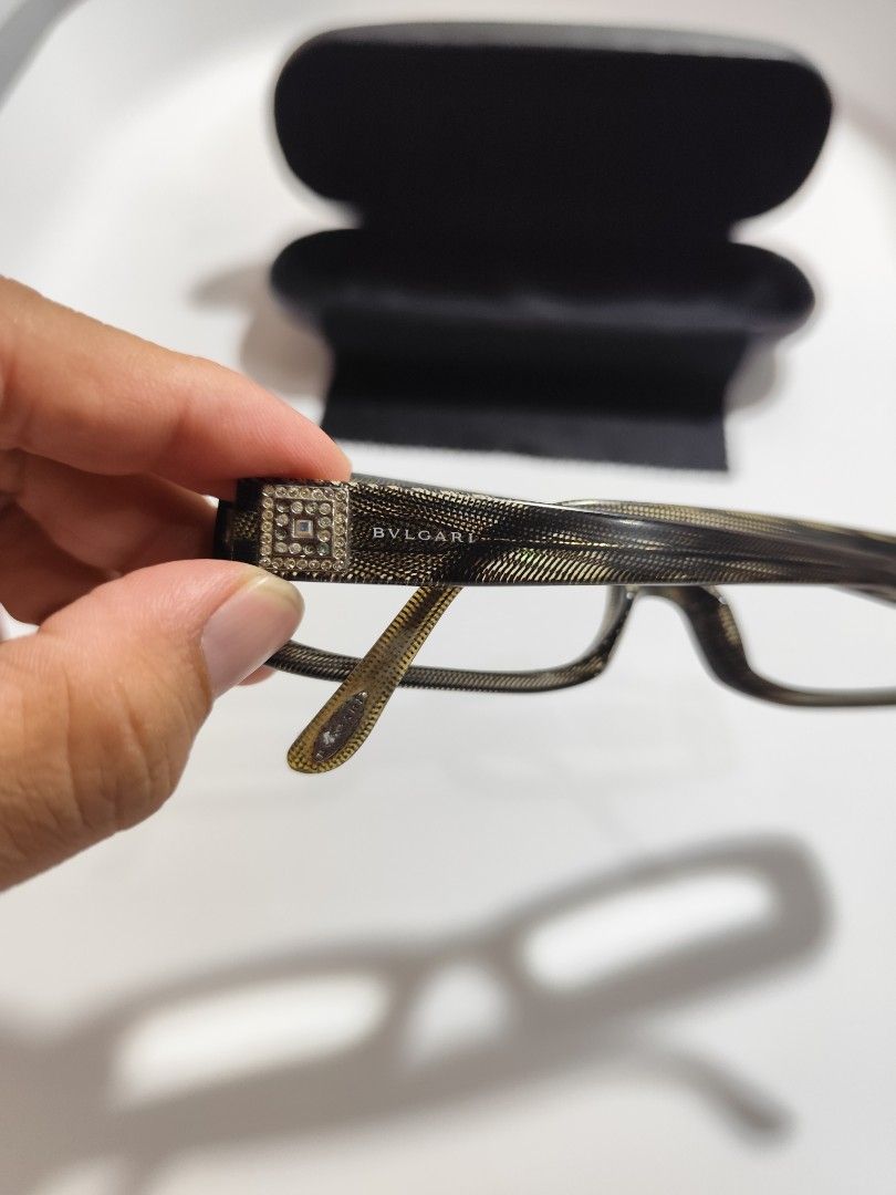 Bvlgari Frame (Category: Sunglasses & Eyewear) located in Cebu City. Submitted by icoolectnsellect (Listing ID 1465725633, Image 3). Description: Issue:Minor Scratches Dirt and RX lens some missing stone. Bought at Garage Sale. Authenticity not Guaranteed, di ko alam if legit or Fake. Buy @ your own Risk. All EyeGlasses or Sun Glasses ay may Grado or Prescription Glasses. Please be careful para di masira mata nyo, you can change the lens and fram