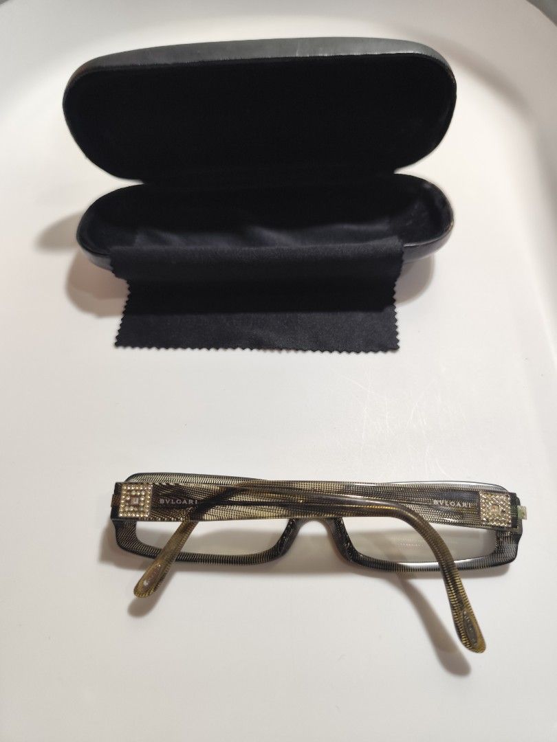 Bvlgari Frame (Category: Sunglasses & Eyewear) located in Cebu City. Submitted by icoolectnsellect (Listing ID 1465725633, Image 2). Description: Issue:Minor Scratches Dirt and RX lens some missing stone. Bought at Garage Sale. Authenticity not Guaranteed, di ko alam if legit or Fake. Buy @ your own Risk. All EyeGlasses or Sun Glasses ay may Grado or Prescription Glasses. Please be careful para di masira mata nyo, you can change the lens and fram