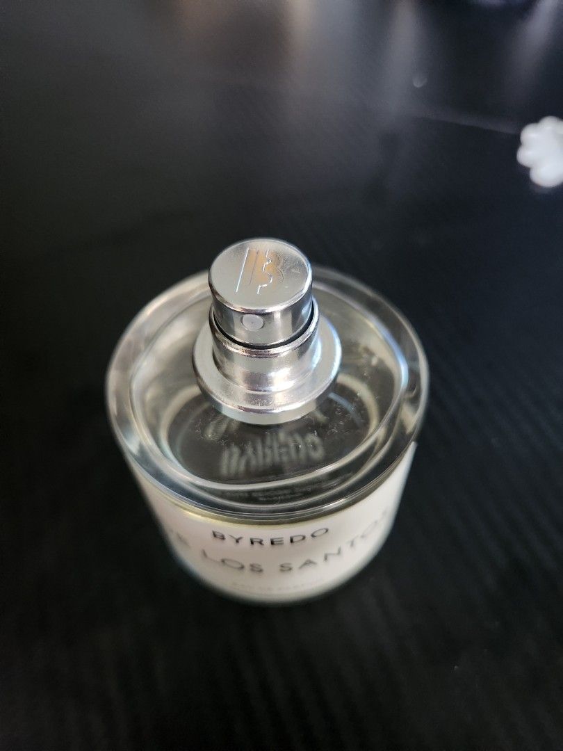 Byredo De Los Santos Eau De Parfum 50ml (Category: Fragrance & Deodorants) located in Rizal. Submitted by hao_mpreg (Listing ID 1465608051, Image 3). Description: - Item: Byredo De Los Santos Eau de Parfum - Size: 50ml (Full level visible, sprayed only a couple of times) - Authenticity details: Magnetic black cap - with engraved branding, batch details and 'Made in France' stamped on the heavy glass base - Bought it from a friend which was origin