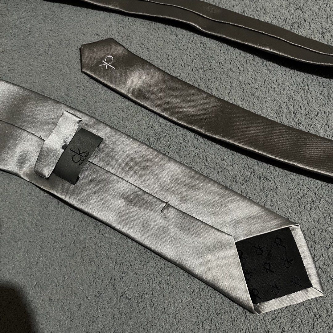 Calvin Klein Necktie (Category: Luxury Accessories) located in Hagonoy. Submitted by ianthrift_ph (Listing ID 1465717884, Image 3). Description: pristine condition color rate 10/10 no issue.