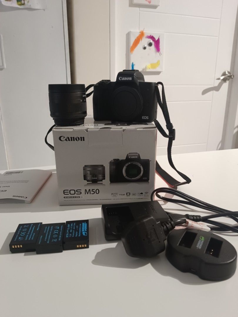 Canon EOS M50 Mirrorless Camera + 15-45mm Lens – Complete Set (Category: Cameras) located in Pasig City. Submitted by mortenk1986 (Listing ID 1465747120, Image 1). Description: Canon EOS M50 mirrorless camera with EF-M 15-45mm IS STM kit lens. Barely used and in very good condition. Fully working, with the screen, controls, autofocus and lens all functioning properly. Includes: Canon EOS M50 body Canon EF-M 15-45mm IS STM lens Original Canon char