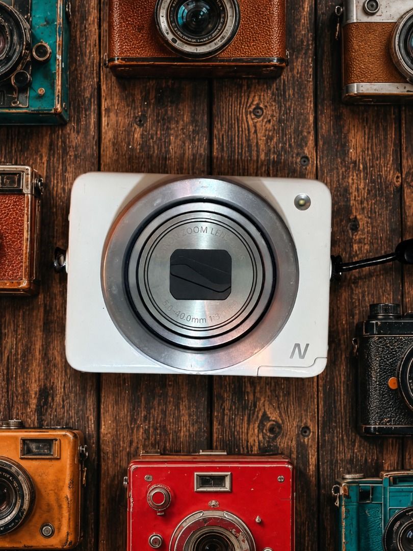Canon PowerShot N Digital Camera (Category: Cameras) located in Manila. Submitted by timelessshotsph (Listing ID 1445342512, Image 1). Description: 📸 FOR SALE: Canon PowerShot N Digital Camera A unique and highly sought-after compact camera with a distinctive square design — a rare find for collectors, enthusiasts, and anyone looking for a stylish conversation piece that still delivers great photos! 📷✨ 📌 Condition: ✔ Body: 9/10 – Very clean un