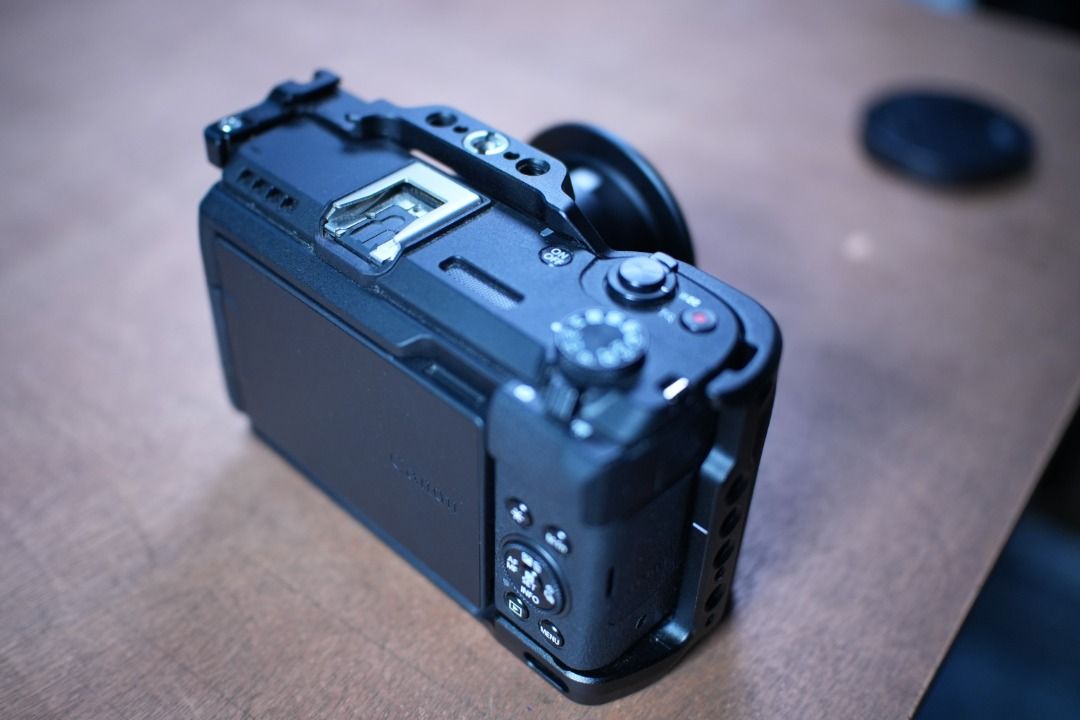 Canon PowerShot V1 with SmallRig Cage and JJC Filter Adapter (Category: Cameras) located in Caloocan City. Submitted by yuranet (Listing ID 1465602977, Image 2). Description: - Canon PowerShot V1 camera, fully kitted out for vlogging and street shooting - Fitted SmallRig metal cage in clean condition with minimal wear - JJC 58mm filter adapter securely mounted to the lens - All-in-one setup perfect for content creators.