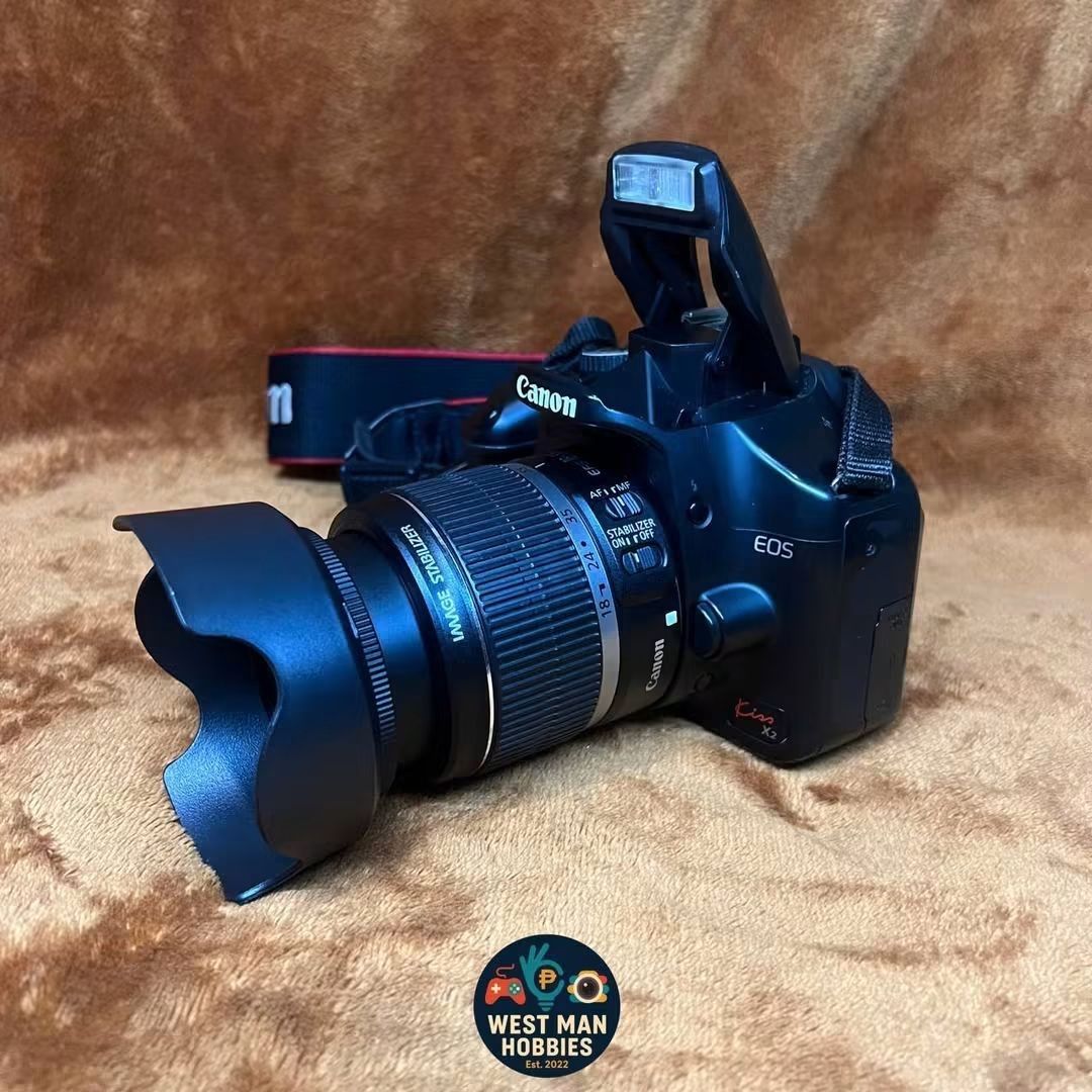 Canon X2 dslr camera (Category: Cameras) located in Manila. Submitted by westmanhobbies-2022 (Listing ID 1465682961, Image 2). Description: Canon Eos Kiss X2 dslr (Preloved) 12 APS-C Cmos sensor Viewfinder/live view 9.5/10 body condition (sellers rate) Flash working 18/55mm lens working af/mf All buttons working No issue may slight dirt lang viewfinder. Sample shots posted! Complete Inclusion: Unit/lens/battery/charger/lenscap/bodycap/strap/lensh