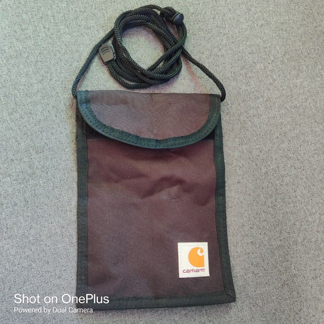 Carhartt Wip Collins neck pouch (Category: Belt bags, Clutches and Pouches) located in Baguio. Submitted by ferns_garage.0924 (Listing ID 1465580889, Image 1). Description: authentic Carhartt Collins neck pouch 100% polyester excellent condition black actual color color condition 10 of 10 (color may vary due to lighting) Velcro closure in excellent condition can fit phone,powerbanks, with 4 compartments. complete tags(documents) issue:none MOP GC