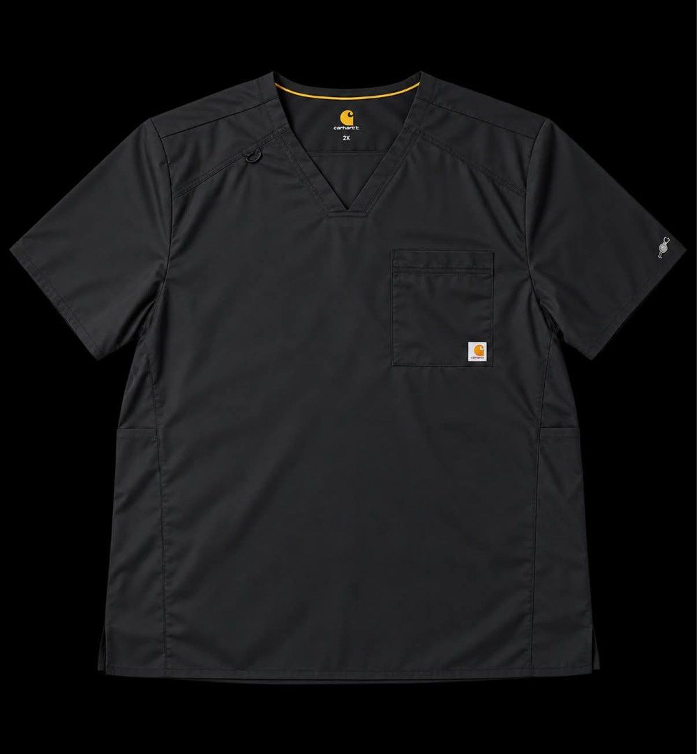 Carhartt V-Neck Scrub Top Black 2X (Category: Activewear) located in Manila. Submitted by penaflorlo52034 (Listing ID 1465627165, Image 1). Description: - Brand/Model: Carhartt Scrub Top - Size: 2X - Color: Solid Black with contrast yellow inner trim - Neckline: V-neck design - Pockets & Storage: Chest pocket with Carhartt logo patch and utility loops near the shoulder - Special Feature: Stethoscope holder graphic detail on the sleeve - Fit: Shor
