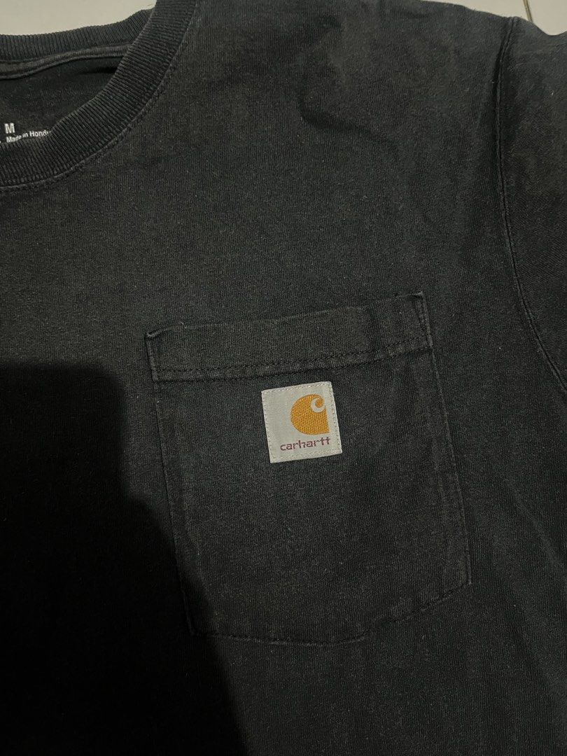 Carhartt pocket tee (Category: Activewear) located in Cebu City. Submitted by thrift.sht (Listing ID 1465592684, Image 2). Description: Carhartt WIP Size: medium to large Color rate: 9.8/10.