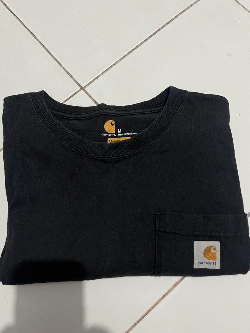 Carhartt pocket tee (Category: Activewear) located in Cebu City. Submitted by thrift.sht (Listing ID 1465592684, Image 3). Description: Carhartt WIP Size: medium to large Color rate: 9.8/10.