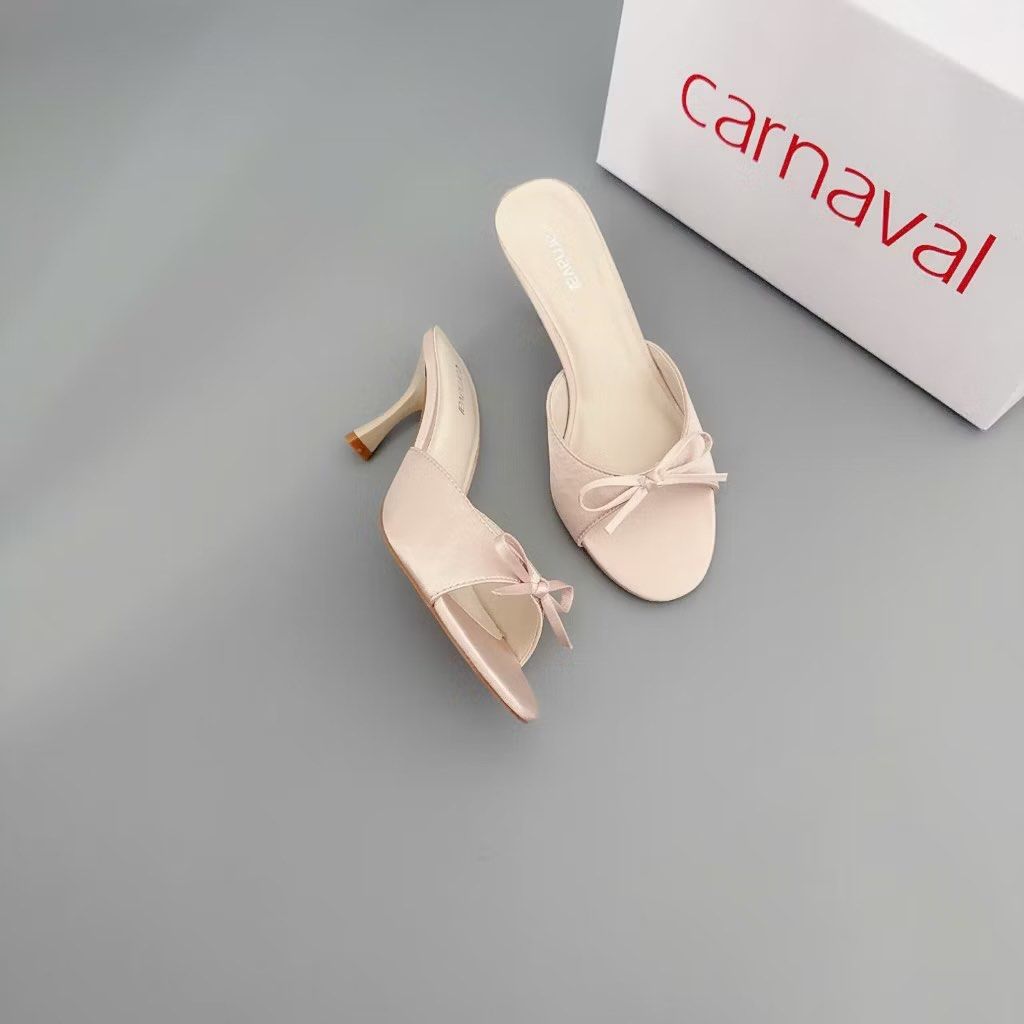 Carnaval 7cm High Heels (Category: Heels) located in Marikina City. Submitted by preloved_n_reloved (Listing ID 1465662988, Image 2). Description: - Brand: Carnaval - Style: slip-on heels with slim stiletto heel - Design: Open toe with a delicate bow on top - Condition: Clean and neatly kept - Inclusion: Original box included.