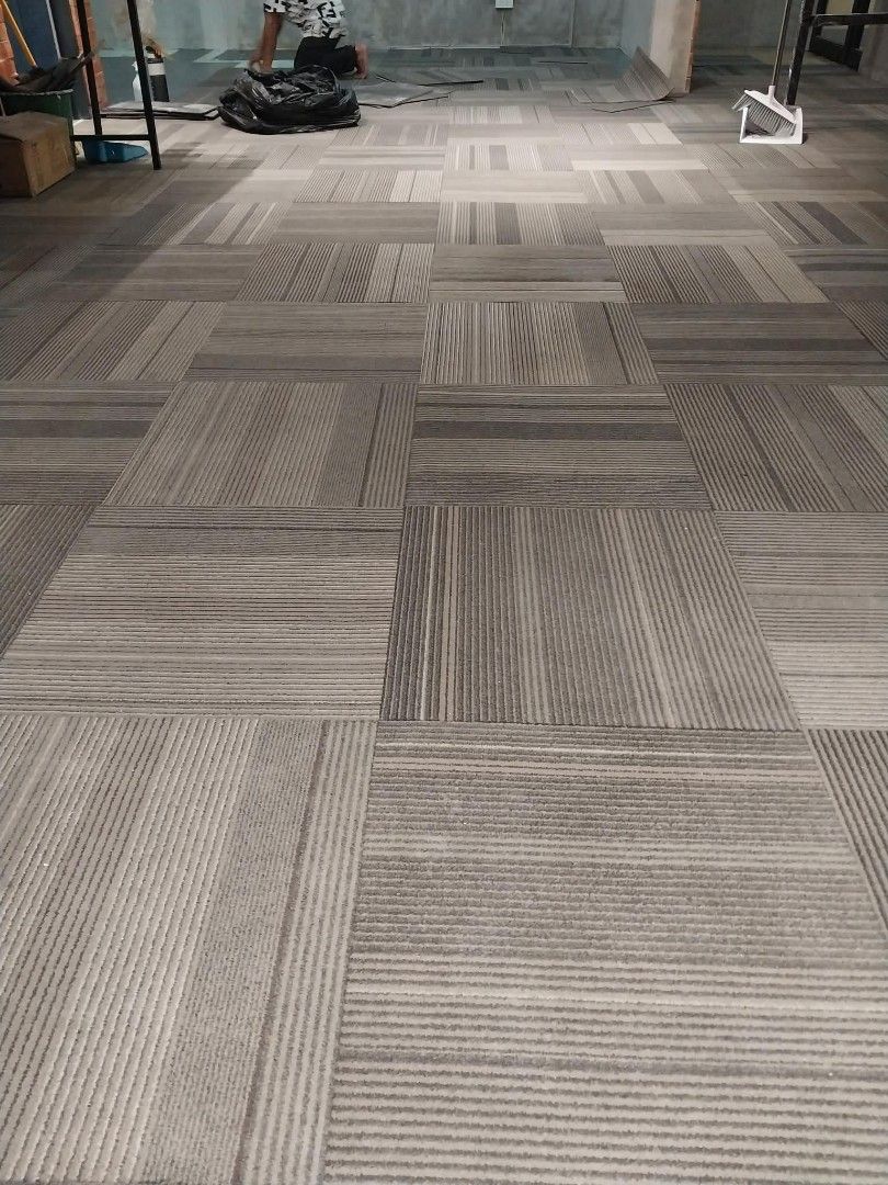 Carpet tiles 50x50CM rubber backing (Category: Other Home Furniture) located in Binan City. Submitted by plesisrhin96177 (Listing ID 1465659101, Image 1). Description: used carpet tiles color: Light brown and gray 50x50cm dimension Rubberized ang likod Ready to install 📩📩📩.