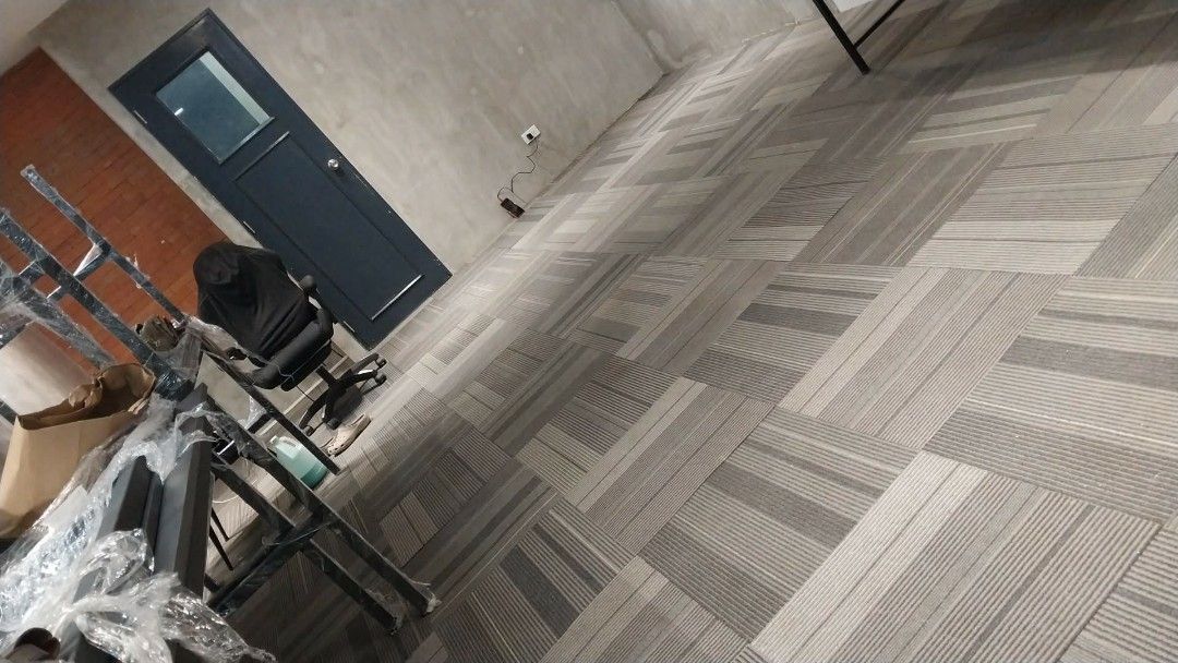 Carpet tiles 50x50CM rubber backing (Category: Other Home Furniture) located in Binan City. Submitted by plesisrhin96177 (Listing ID 1465659101, Image 2). Description: used carpet tiles color: Light brown and gray 50x50cm dimension Rubberized ang likod Ready to install 📩📩📩.