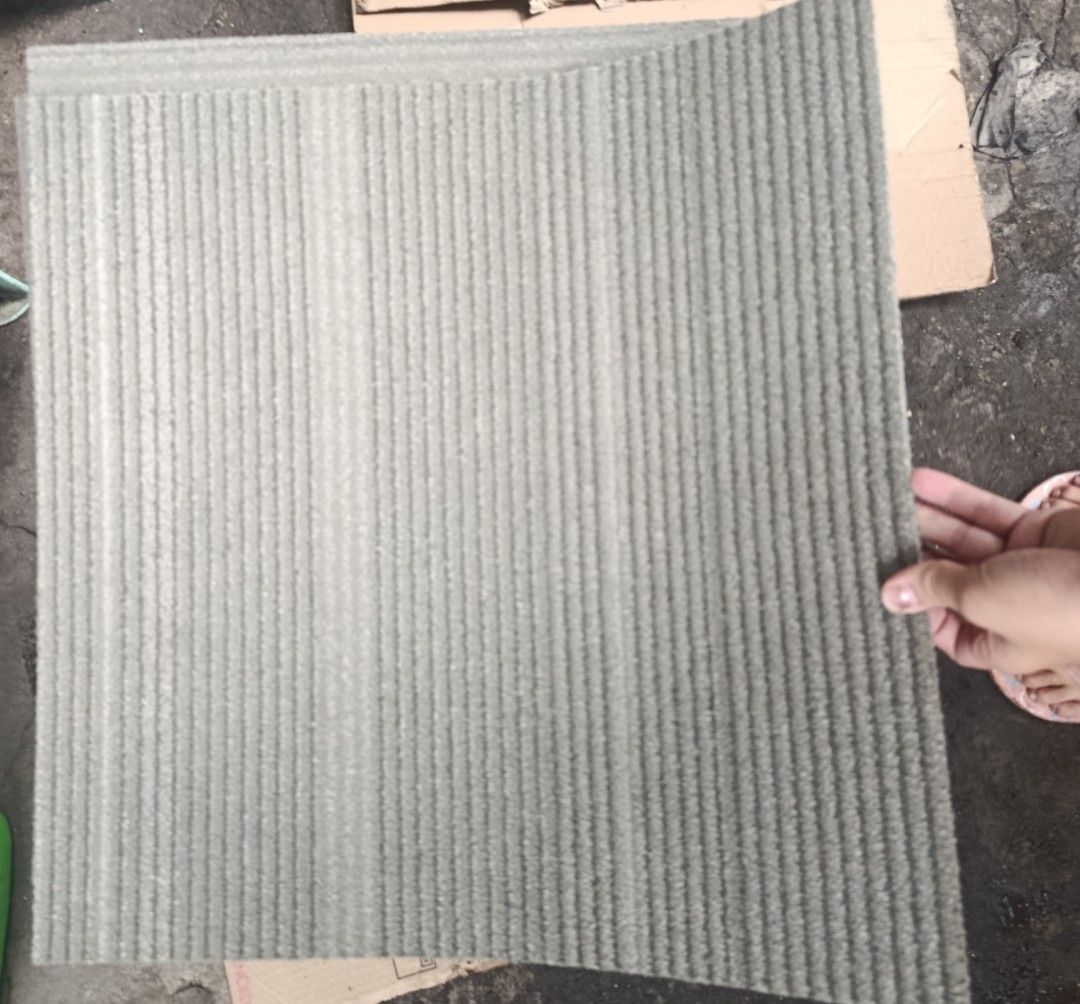 Carpet tiles 50x50CM rubber backing (Category: Other Home Furniture) located in Binan City. Submitted by plesisrhin96177 (Listing ID 1465659101, Image 3). Description: used carpet tiles color: Light brown and gray 50x50cm dimension Rubberized ang likod Ready to install 📩📩📩.