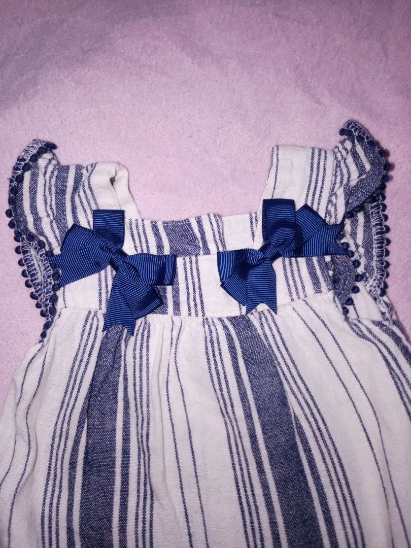 Carter's Coords (Category: Babies & Kids Fashion) located in Sipocot. Submitted by mszari (Listing ID 1465752927, Image 3). Description: Details: Woven cotton texture, navy bows, pom-pom trim, matching bloomer shorts — complete 2-piece set! Size: 3-6 months Condition: Very neat, fabric crisp ✨.