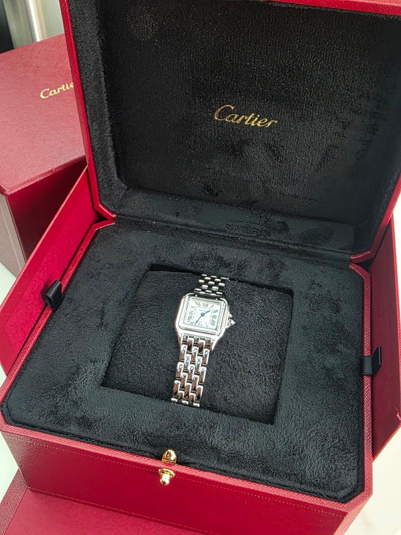 Cartier Panthere Small BRAND NEW (Category: Luxury Watches) located in Pasig City. Submitted by nicoleenrico03 (Listing ID 1465633838, Image 2). Description: - Brand: Cartier Panthere - Material: Stainless steel - Dial: White with classic Roman numerals and blue sword hands - Bracelet: Multi-link bracelet with a secure clasp - Design: Timeless square case, perfect everyday luxury piece - Inclusions: Complete with original red Cartier presentation