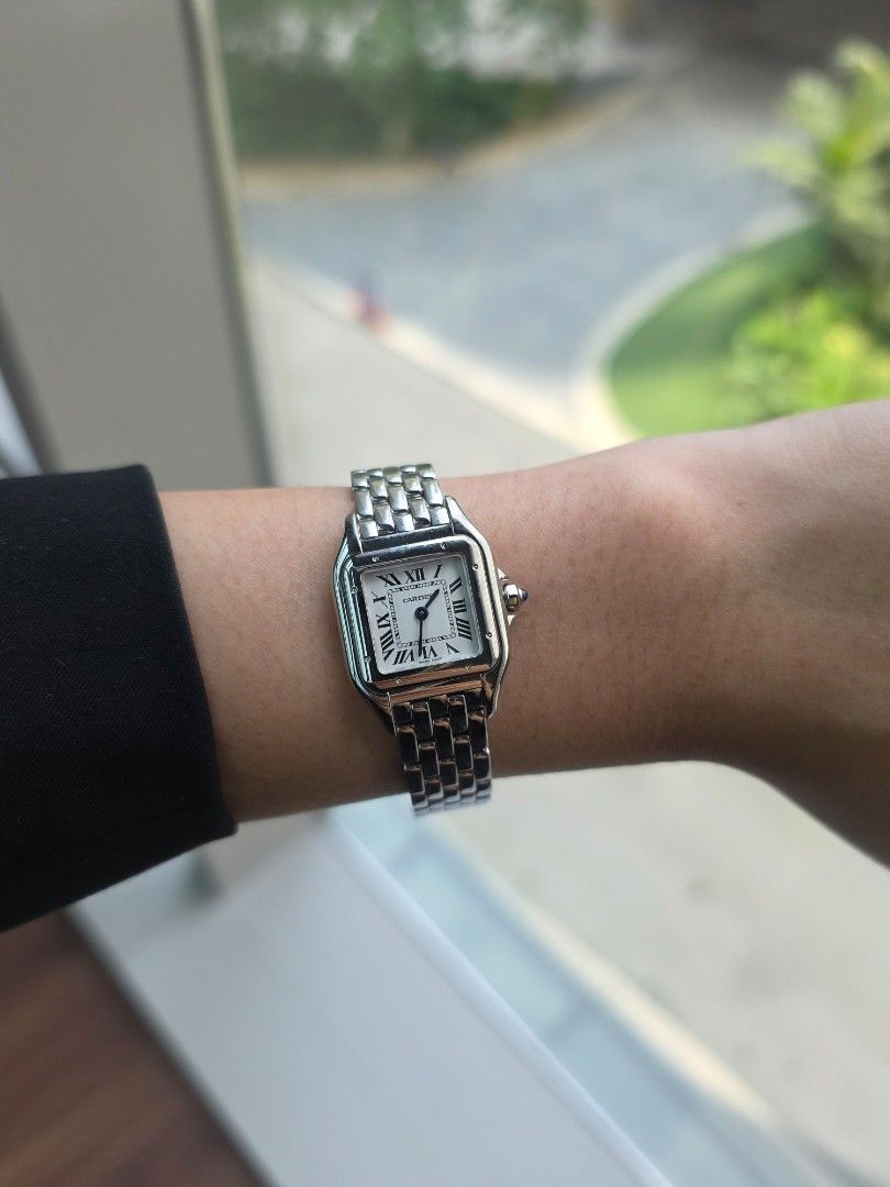 Cartier Panthere Small BRAND NEW (Category: Luxury Watches) located in Pasig City. Submitted by nicoleenrico03 (Listing ID 1465633838, Image 1). Description: - Brand: Cartier Panthere - Material: Stainless steel - Dial: White with classic Roman numerals and blue sword hands - Bracelet: Multi-link bracelet with a secure clasp - Design: Timeless square case, perfect everyday luxury piece - Inclusions: Complete with original red Cartier presentation