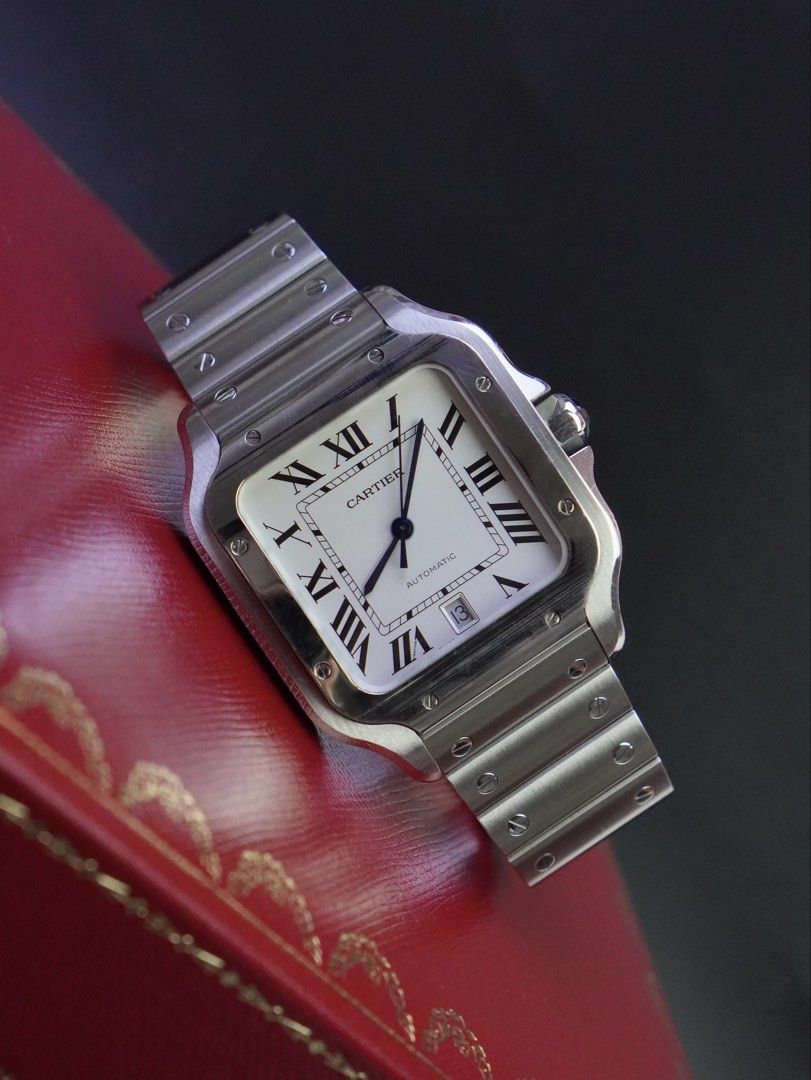 Cartier Santos Large (Category: Men's Watches) located in San Juan City. Submitted by authoritytimepieces (Listing ID 1465608325, Image 1). Description: Cartier Santos Large Reference WSSA009 Year 2018 368,000 only Complete set card and box (no leather strap) Comes with authentication paper Cartier Caliber 1847 42 hours power reserve QuickSwitch system for bracelet & strap SmartLink sizing syztem 40 x 47.5 MM 9.5 / 10 MINT condition Trades are we