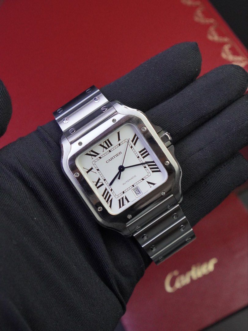 Cartier Santos Large (Category: Men's Watches) located in San Juan City. Submitted by authoritytimepieces (Listing ID 1465608325, Image 3). Description: Cartier Santos Large Reference WSSA009 Year 2018 368,000 only Complete set card and box (no leather strap) Comes with authentication paper Cartier Caliber 1847 42 hours power reserve QuickSwitch system for bracelet & strap SmartLink sizing syztem 40 x 47.5 MM 9.5 / 10 MINT condition Trades are we