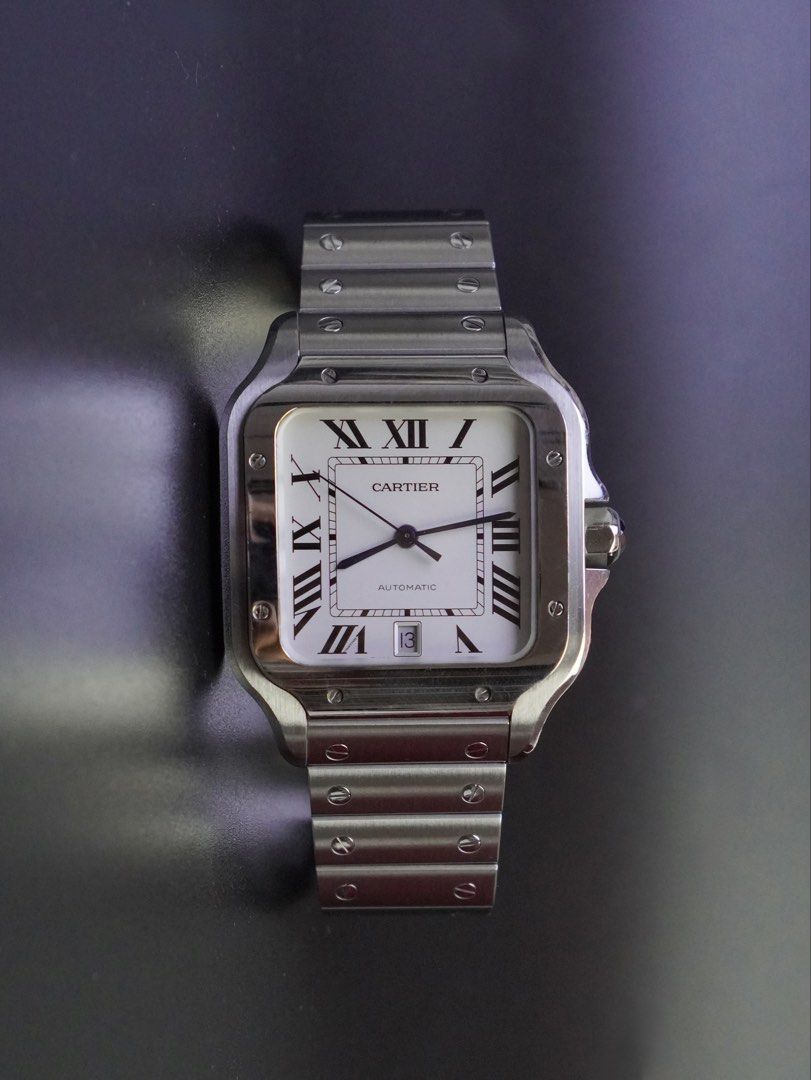 Cartier Santos Large (Category: Men's Watches) located in San Juan City. Submitted by authoritytimepieces (Listing ID 1465608325, Image 2). Description: Cartier Santos Large Reference WSSA009 Year 2018 368,000 only Complete set card and box (no leather strap) Comes with authentication paper Cartier Caliber 1847 42 hours power reserve QuickSwitch system for bracelet & strap SmartLink sizing syztem 40 x 47.5 MM 9.5 / 10 MINT condition Trades are we