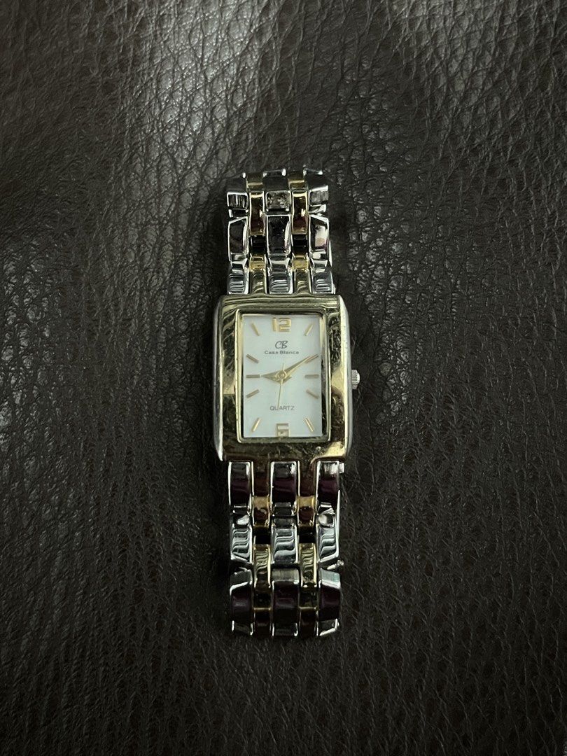 Casa Blanca Two-Tone Quartz Rectangular Watch 25-4776 (Category: Women's Watches) located in Quezon City. Submitted by larenaxoxo (Listing ID 1465699611, Image 1). Description: - Brand/Model: Casa Blanca (Ref: 25-4776) - Movement: Quartz - Dial: Rectangular white dial with gold-tone 12 and 6 markers, plus stick hour markers - Strap: Two-tone silver and gold stainless steel link bracelet - Water Resistance: 30m - New Battery Installed .