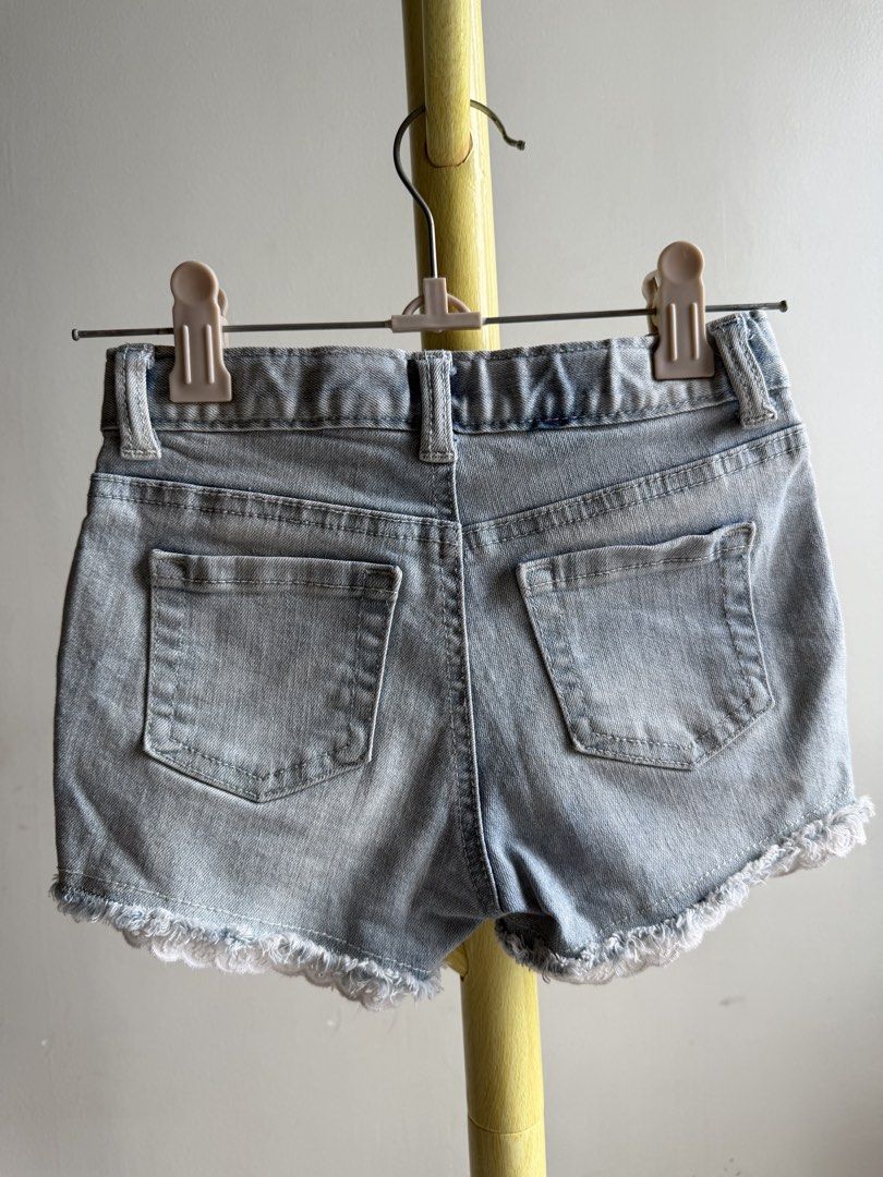 Cat & Jack Light Wash Denim Shorts Size 5T (Category: Babies & Kids Fashion) located in Quezon City. Submitted by warmrabbit_414908 (Listing ID 1465597535, Image 2). Description: - Brand: Cat & Jack - Size: 5T - Color: Light blue wash - Material: Super stretch denim - Features: Distressed raw hem with delicate white lace trim - Pockets: Functional front and back pockets - Fit: Belt loops and convenient inner waist adjuster - Origin: Made in Vietn