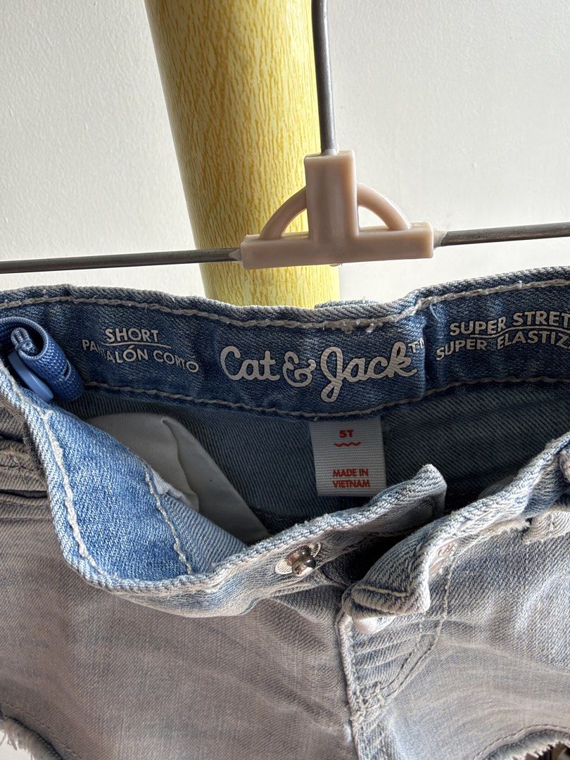 Cat & Jack Light Wash Denim Shorts Size 5T (Category: Babies & Kids Fashion) located in Quezon City. Submitted by warmrabbit_414908 (Listing ID 1465597535, Image 3). Description: - Brand: Cat & Jack - Size: 5T - Color: Light blue wash - Material: Super stretch denim - Features: Distressed raw hem with delicate white lace trim - Pockets: Functional front and back pockets - Fit: Belt loops and convenient inner waist adjuster - Origin: Made in Vietn