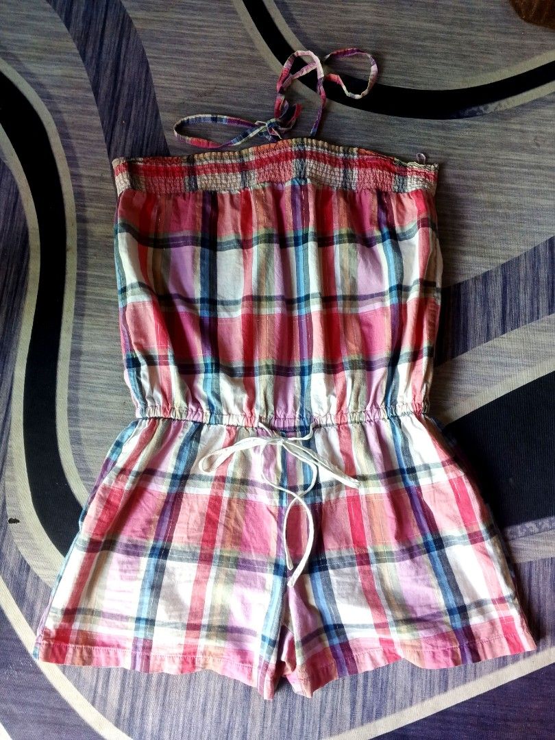 CATO JUMPSUIT (Category: Jumpsuits) located in Manila. Submitted by icamalicdem29 (Listing ID 1465595804, Image 1). Description: Cato brand strapless plaid romper. It features a smocked tube top bodice, a drawstring tie waist, and shorts with a pink, blue, yellow, and white madras plaid pattern..