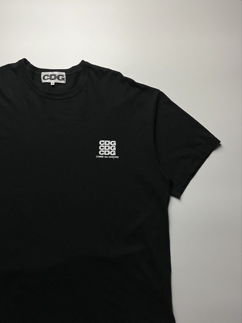 CDG Comme des Garcons Triple Stack Logo Tee (Category: Tshirts & Polo Shirts ) located in Manila. Submitted by streetsavvy (Listing ID 1465666016, Image 3). Description: CDG Comme des Garçons Triple Stack Logo Tee Size: Medium Width: 25” Length: 30” Shoulder: 23” Sleeve Length: 9” Hem: 25.5” Measured in Inches Condition: Excellent condition Flaw: none Made in Japan 100% Cotton.