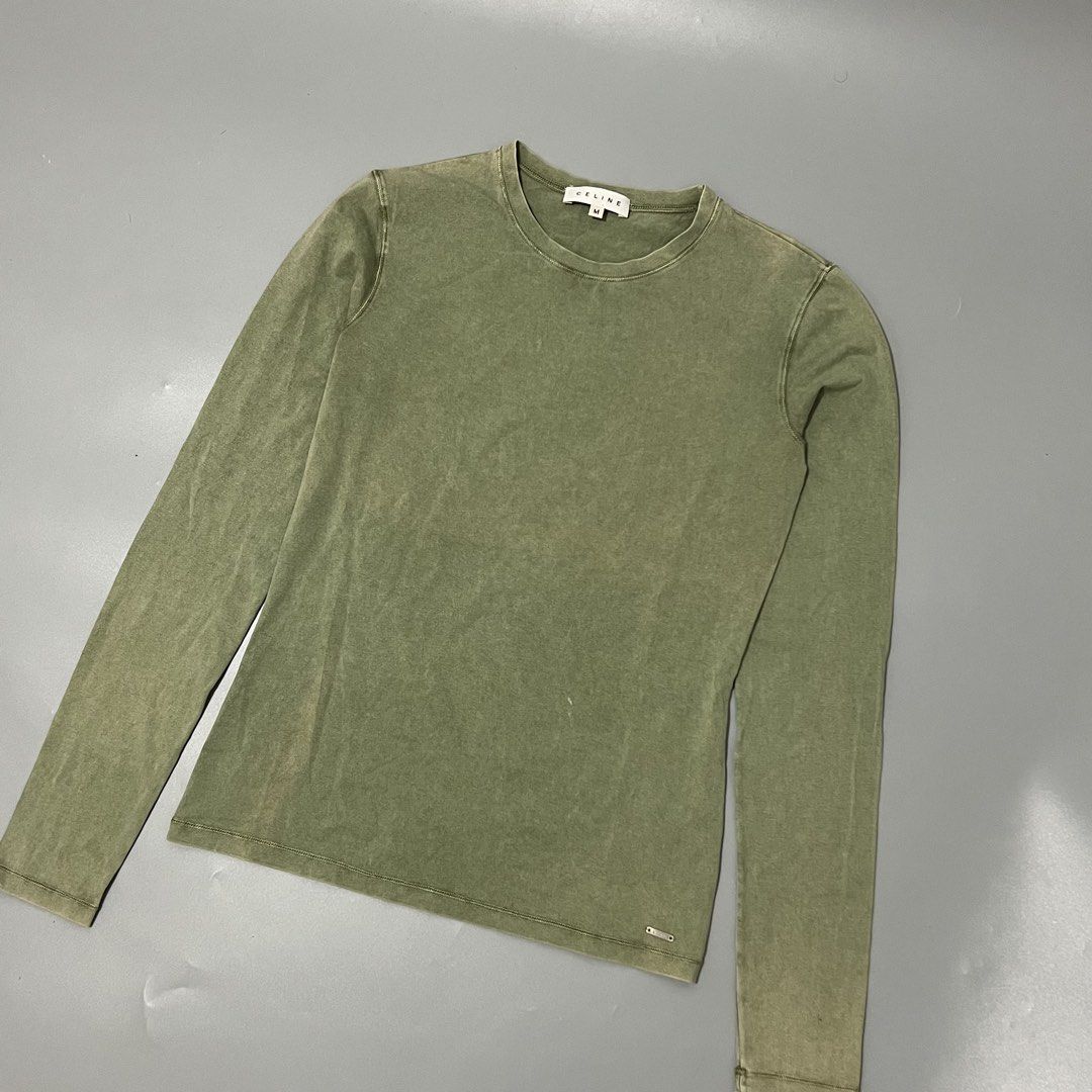 Celine - MK era -Acid wash (Category: Longsleeves) located in Cavite. Submitted by asianluxe (Listing ID 1465699759, Image 2). Description: CELINE-L/S Green Flat measurements’ Length:23.5 inches Width:17 inches stretch Sleeve:24.5 inches Shoulder to shoulder:14.5 inches (Guaranteed authentic) Good condition Very presentable 9/10 condition No damge’ Composition 88% Cotton 12% Elastane.
