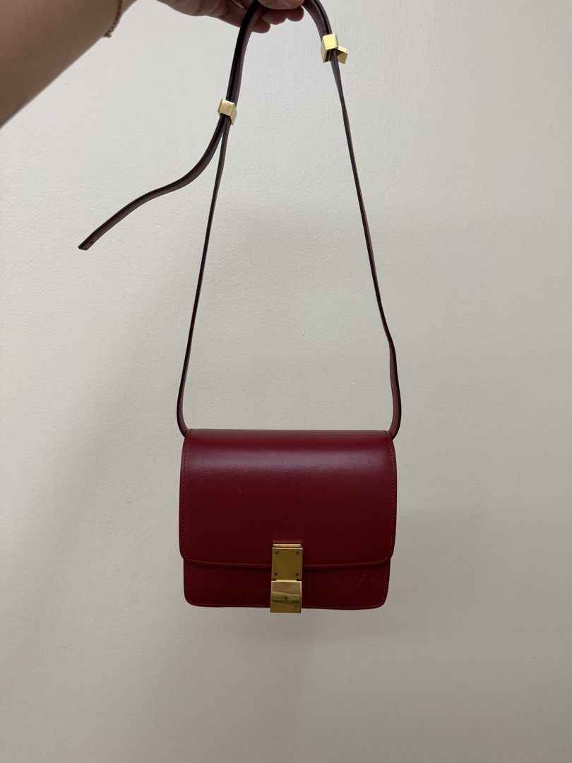 Celine Classic Box Bag Red Leather (Category: Luxury Bags & Wallets) located in Manila. Submitted by tashvintagefinds (Listing ID 1465636804, Image 1). Description: - Authentic Celine classic box bag - size small - Red calfskin - overall condition is nice but there are sratches/marks (shown in photos) - slightly nego.