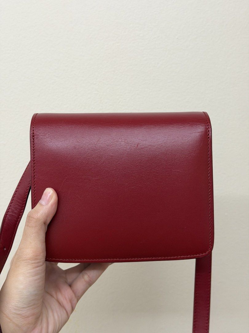 Celine Classic Box Bag Red Leather (Category: Luxury Bags & Wallets) located in Manila. Submitted by tashvintagefinds (Listing ID 1465636804, Image 3). Description: - Authentic Celine classic box bag - size small - Red calfskin - overall condition is nice but there are sratches/marks (shown in photos) - slightly nego.
