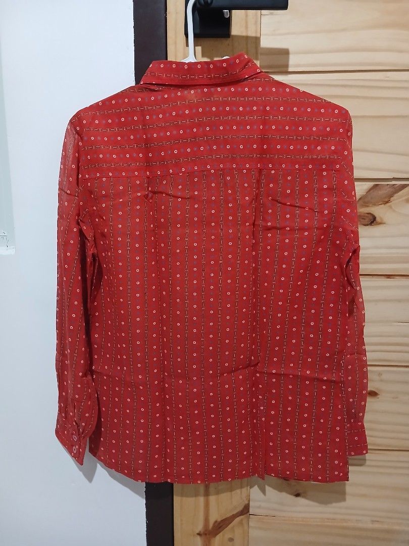 Celine Paris Vintage Red Patterned Long Sleeve Shirt (Category: Longsleeves) located in Quezon City. Submitted by mcenon35 (Listing ID 1465657431, Image 2). Description: - Brand: Céline Paris - Style: Vintage long-sleeve button-down shirt - Color: Vibrant red with floral and chain link patterns - Material: 100% cotton - Origin: Made in Switzerland - Condition: Classic designer piece in great vintage condition.