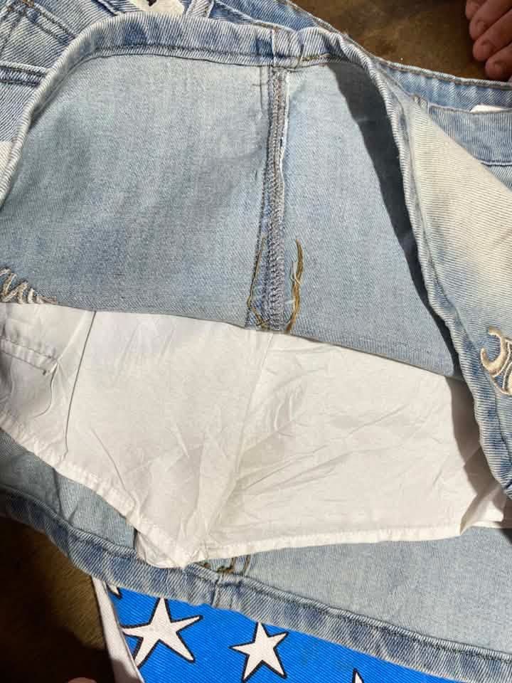 Celxnie Denim Skort Light Wash Size W30-32 (Category: Skirts) located in Manila. Submitted by lucky_jinky (Listing ID 1465631103, Image 2). Description: W:30-32 L:14 - Brand: Celxnie - Style: Light wash denim skort - Comfort: Built-in white shorts underneath for worry-free movement - Details: Front embroidered branding with metallic accents - Fit: Front button and zipper closure with belt loops - Pockets: Classic five-pocket style.