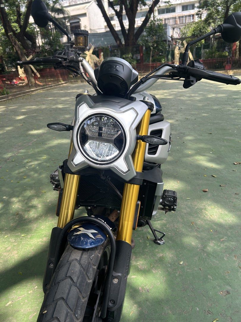 Cfmoto Clx700 Heritage Rush (Category: Motorbikes for Sale) located in Quezon City. Submitted by olivertomtecson8 (Listing ID 1465637161, Image 3). Description: Lowest in the Market 2023 Acquired CLX700 Heritage 700CC for less than 200K❗️❗️ WITH Cruise Control Owner Seller Complete papers (ORCR, Booklet, Manual, Sales Receipt) Rear Tire - 180/55 R-17 Mileage 14K Newly registered Newly changed oil Accessories ❗️ TDD Light Frame slider Radiator Gua