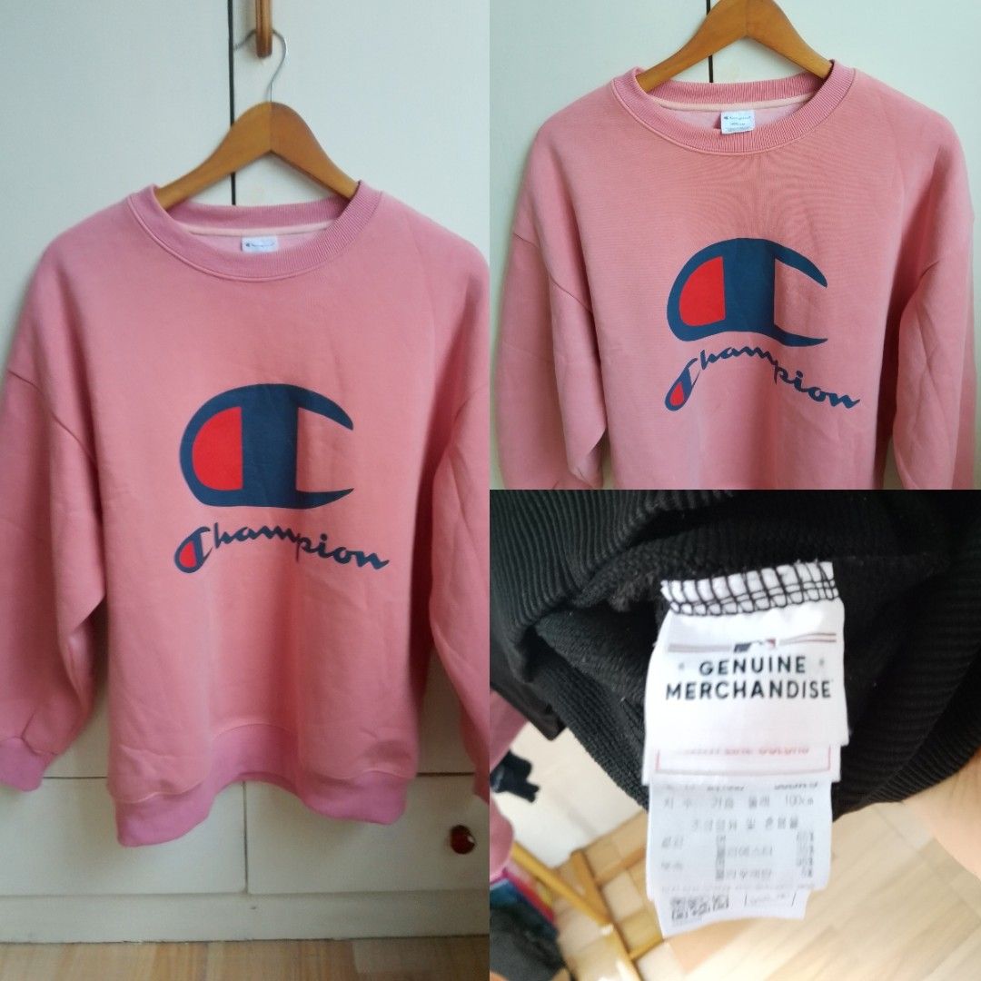 Champion Big Logo Pink Sweatshirt (Category: Coats, Jackets and Outerwear) located in Bogo. Submitted by algarme2018 (Listing ID 1465750041, Image 1). Description: - Pink Champion sweatshirt with iconic blue and red logo graphic - Size: 100/L with a comfortable, relaxed fit - Ribbed crew neck, cuffs, and hem for added durability - Clean interior with a crisp, vibrant print - Easy to style with casual jeans or joggers - Condition: Excellent, well-