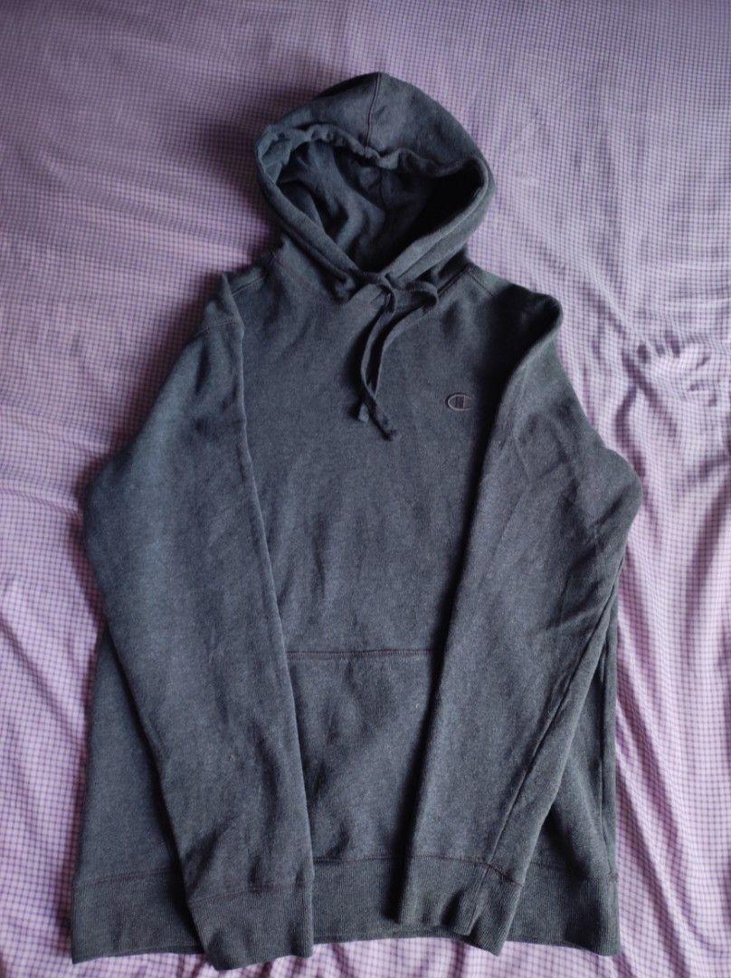 Champion Charcoal Grey Hoodie (Category: Hoodies) located in Batangas. Submitted by astrofinds_ (Listing ID 1465598775, Image 1). Description: - Brand: Champion - Color: Charcoal Dark Grey - Size: L to XL - Width: 22-23 Length: 28 - Material: Cotton and polyester blend (Made in Vietnam) - Interior: Soft fleece lining for extra warmth - Features: Front kangaroo pocket, adjustable drawstring hood - Branding: Embroidered Champion logo on chest and s