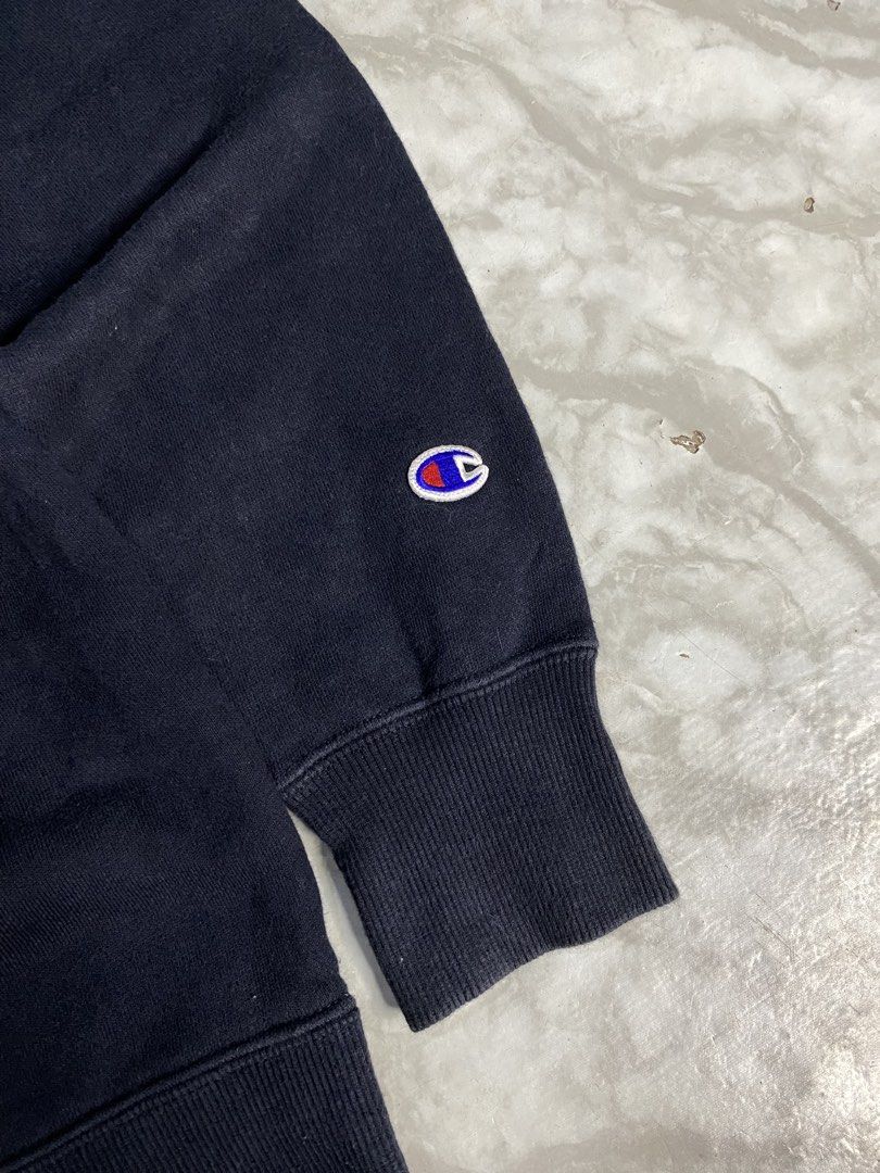 Champion Reverse Weave Crewneck (Category: Coats, Jackets and Outerwear) located in Calabanga. Submitted by 4405.curator (Listing ID 1465593291, Image 3). Description: Classic black Champion crewneck sweatshirt. Embroidered logo on the chest and smaller logo patch on the left sleeve cuff. Ribbed collar, cuffs, and hem keep their shape well. Tag shows size Large. Great basic piece for everyday layering. Comfortable fleece lining inside..