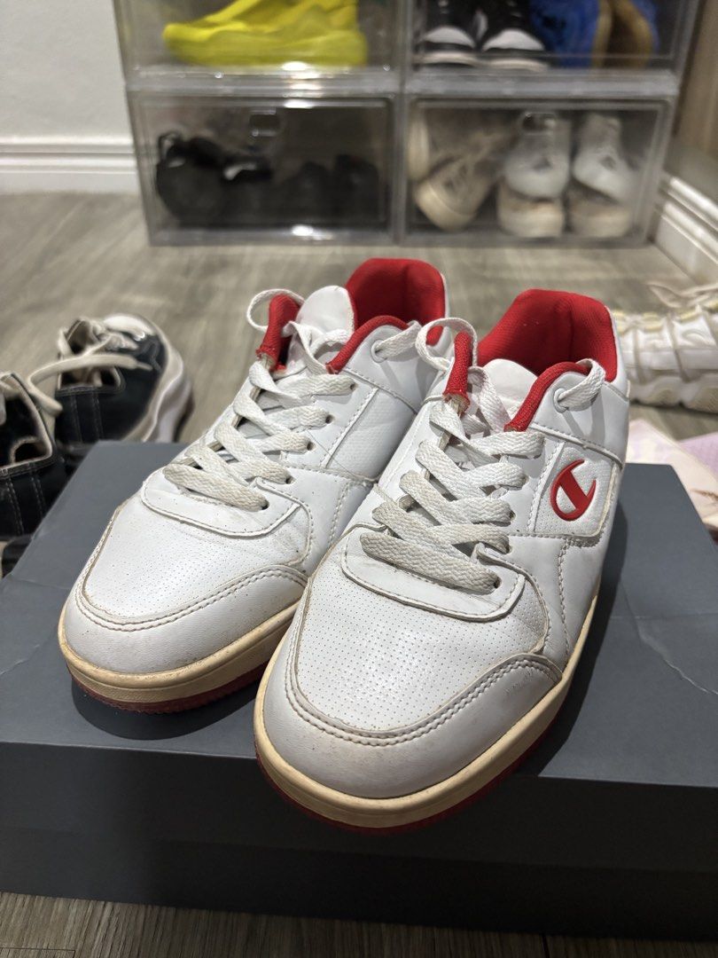 Champion White and Red Low-Top Sneakers (Category: Sneakers) located in San Pablo. Submitted by loved.goods0501 (Listing ID 1465700079, Image 1). Description: Brand: Champion Size: EUR 38 Condition: Midsole has natural yellowing from age and wear. Soles show visible dirt and scuffing from past use no box, just shoes.