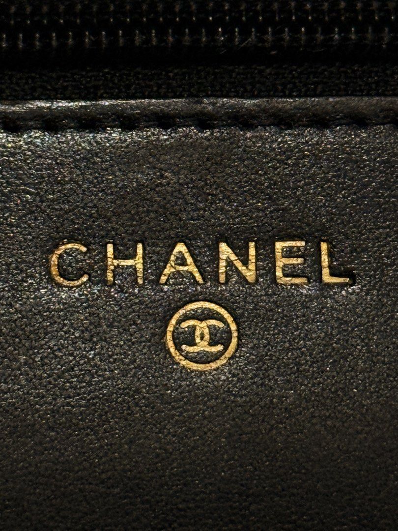 Chanel Black Quilted Leather Flap Bag (Category: Luxury Bags & Wallets) located in Manila. Submitted by bilog_khairmuchuan (Listing ID 1465609529, Image 3). Description: - Brand: Chanel - Material: Black quilted lambskin leather - Hardware: Gold-tone - Closure: Interlocking CC turn-lock on front flap - Interior: Burgundy fabric lining with zipped pocket and gold heat-stamped logo - Special Feature: Snap button pocket under the flap - Strap: Inter