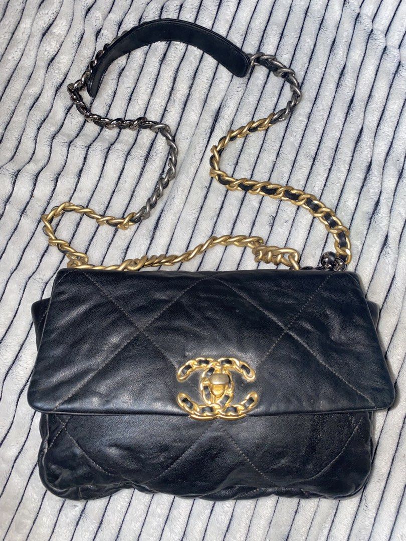 Chanel Black Quilted Leather Shoulder Bag (Category: Luxury Bags & Wallets) located in Manila. Submitted by ukayganda08 (Listing ID 1465636509, Image 1). Description: - Brand: Chanel - Material: Premium black quilted leather - Hardware: Mixed gold and dark ruthenium chain strap - Closure: Front flap with iconic CC turn-lock - Interior: Burgundy fabric lining with zipped pocket and gold Chanel logo plaque - Special Features: Magnetic snap side com