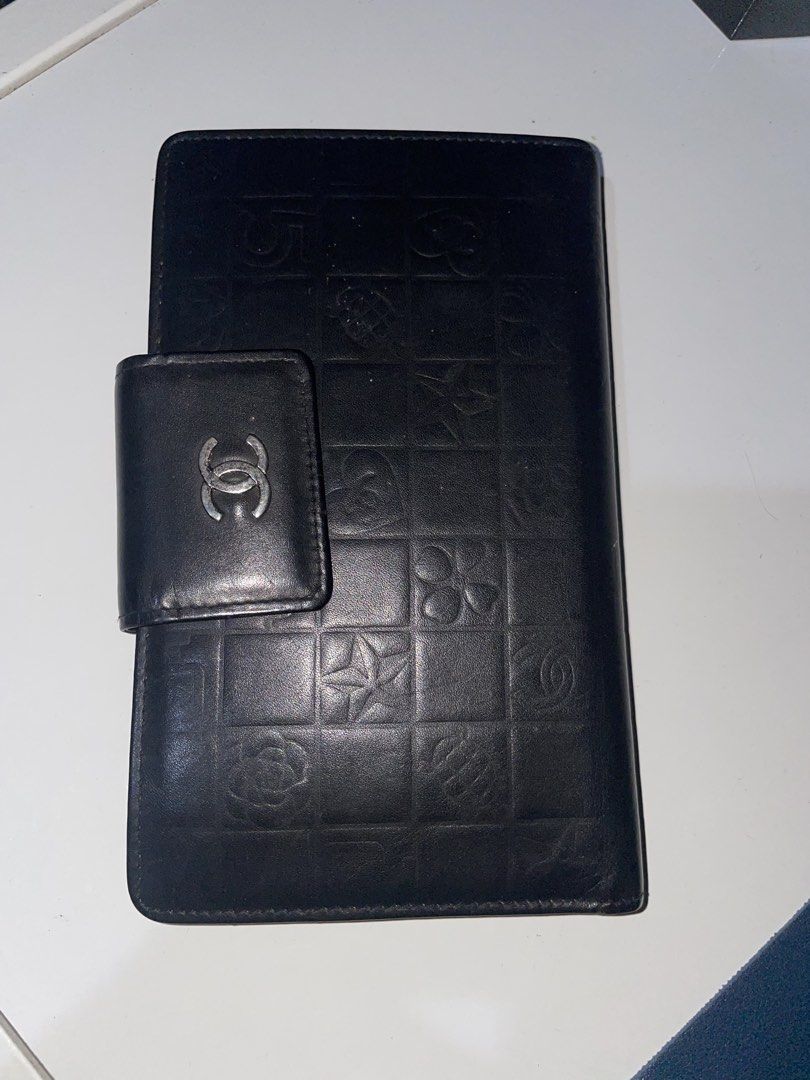 Chanel Wallet (Category: Wallets & Card holders) located in Caloocan City. Submitted by wisteria00 (Listing ID 1465742550, Image 1). Description: Model: Chanel Icon Line BiFold Kisslock Wallet Price: ₱11,500 This is a pre-loved vintage item. • Functionality: 10/10. Kisslock snaps tight. No holes. • Aesthetics: 7/10. Shows normal signs of usage. INCLUSIONS: • Wallet + Authenticity Card North Caloocan.