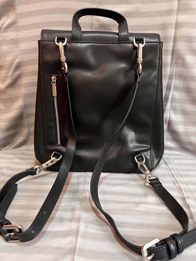 CHARLES & KEITH OCTAVIA FRONT-FLAP BACKPACK (Category: Backpacks) located in Manila. Submitted by nlgll (Listing ID 1465695629, Image 2). Description: FOR SALE CHARLES & KEITH OCTAVIA FRONT-FLAP BACKPACK Selling my Charles & Keith Octavia Front-Flap Backpack – Noir for ₱4,200 Details: * Authentic Charles & Keith * Color: Noir/Black * Material: Calf PU * Magnetic closure * Adjustable & detachable straps * Dimensions: 30 × 25–34 × 13 cm * Spacious 