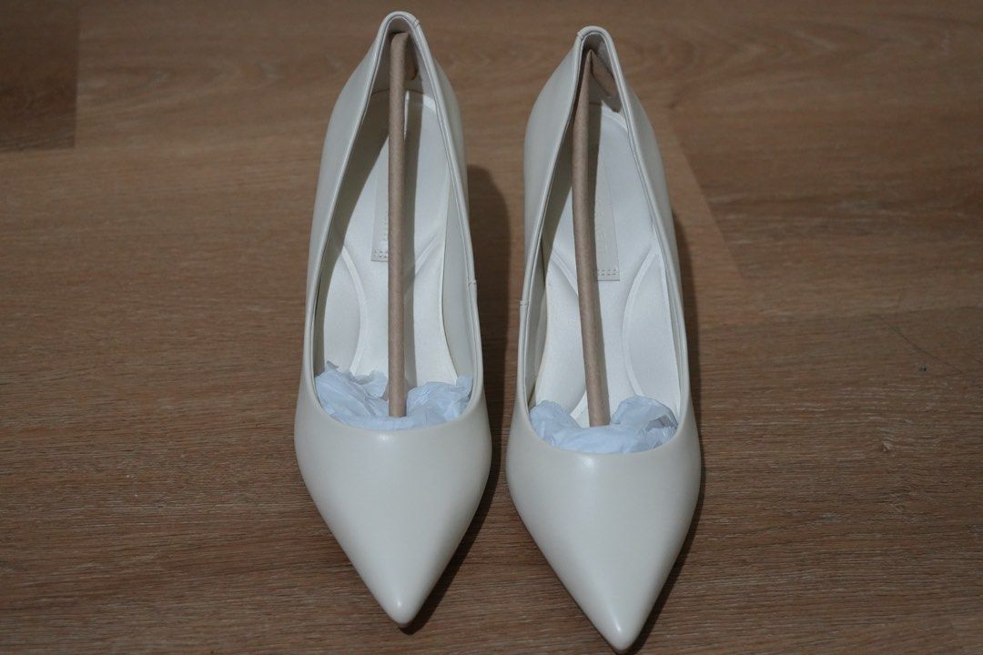 Charles & Keith White Stiletto Pumps (Category: Heels) located in Cainta. Submitted by karsssss (Listing ID 1465756857, Image 2). Description: - Brand: Charles & Keith - Color: Chalk White - Style: Pointed Stiletto Pumps - Design: Classic and versatile - Occasion: Perfect for work/wedding/ events - Features: Comfortable padded insoles, moderate heel height - size 37.