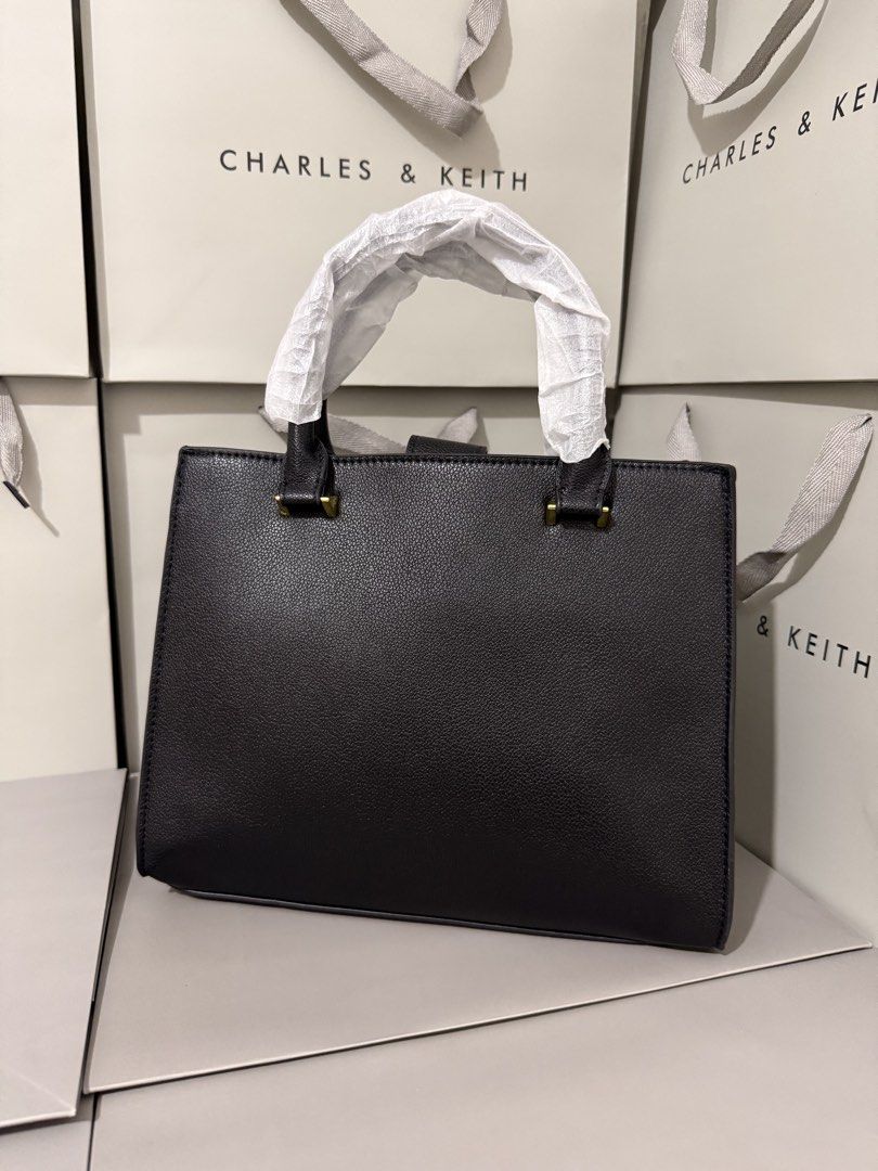 Charles&keith Anwen structured tote bag (Category: Cross-body Bags) located in Cavite. Submitted by miksycrls (Listing ID 1465670847, Image 3). Description: C& KEITH BAGS AVAILABLE✨👜🛍️ 📌REMINDER PLS READ BELOW ⬇️ ✨INCLUSION✨ 🔗TAG&DUSTBAG 🔗WHAT YOU SEE IS WHAT YOU GET 🔗manage your expectations items are MPO | Mall Pull Out 📩 TO ORDER | ASK DETAILS | PHOTO’S: Send me a private message! +60paperbag 💸:GCASHH/GOTYMEE 📍:IMUSCAVITE 🚚:SCO|SPX E