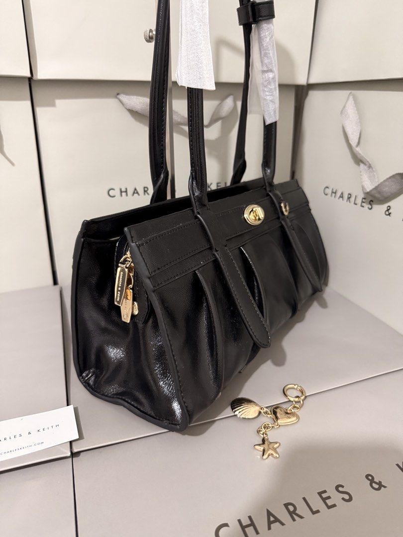 Charles&keith Isolde ruched shoulder bag (Category: Cross-body Bags) located in Cavite. Submitted by miksycrls (Listing ID 1465626675, Image 2). Description: C& KEITH BAGS AVAILABLE✨👜🛍️ 📌REMINDER PLS READ BELOW ⬇️ ✨INCLUSION✨ 🔗TAG&DUSTBAG 🔗WHAT YOU SEE IS WHAT YOU GET 🔗manage your expectations items are MPO | Mall Pull Out 📩 TO ORDER | ASK DETAILS | PHOTO’S: Send me a private message! +60paperbag 💸:GCASHH/GOTYMEE 📍:IMUSCAVITE 🚚:SCO|SPX 