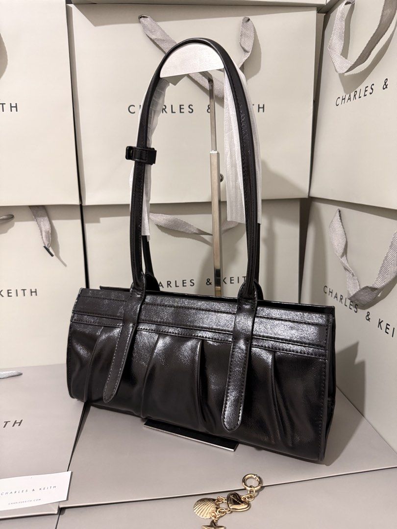Charles&keith Isolde ruched shoulder bag (Category: Cross-body Bags) located in Cavite. Submitted by miksycrls (Listing ID 1465626675, Image 3). Description: C& KEITH BAGS AVAILABLE✨👜🛍️ 📌REMINDER PLS READ BELOW ⬇️ ✨INCLUSION✨ 🔗TAG&DUSTBAG 🔗WHAT YOU SEE IS WHAT YOU GET 🔗manage your expectations items are MPO | Mall Pull Out 📩 TO ORDER | ASK DETAILS | PHOTO’S: Send me a private message! +60paperbag 💸:GCASHH/GOTYMEE 📍:IMUSCAVITE 🚚:SCO|SPX 