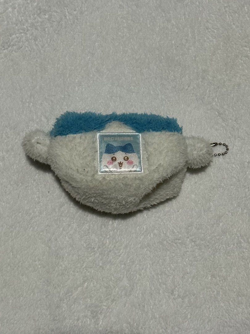 Chiikawa Hachiware Mini Plush Pouch (Category: Plushies & Soft Toys) located in Mandaluyong City. Submitted by myeonii.e (Listing ID 1465752233, Image 2). Description: Got this from a Japan seller, check pic for etiketa, no tag. Pouch needs wash, it got dusty in my room. Price is already last price. Feel free to message me if you have any questions or inquiries! I can send more pictures upon request 🤍.