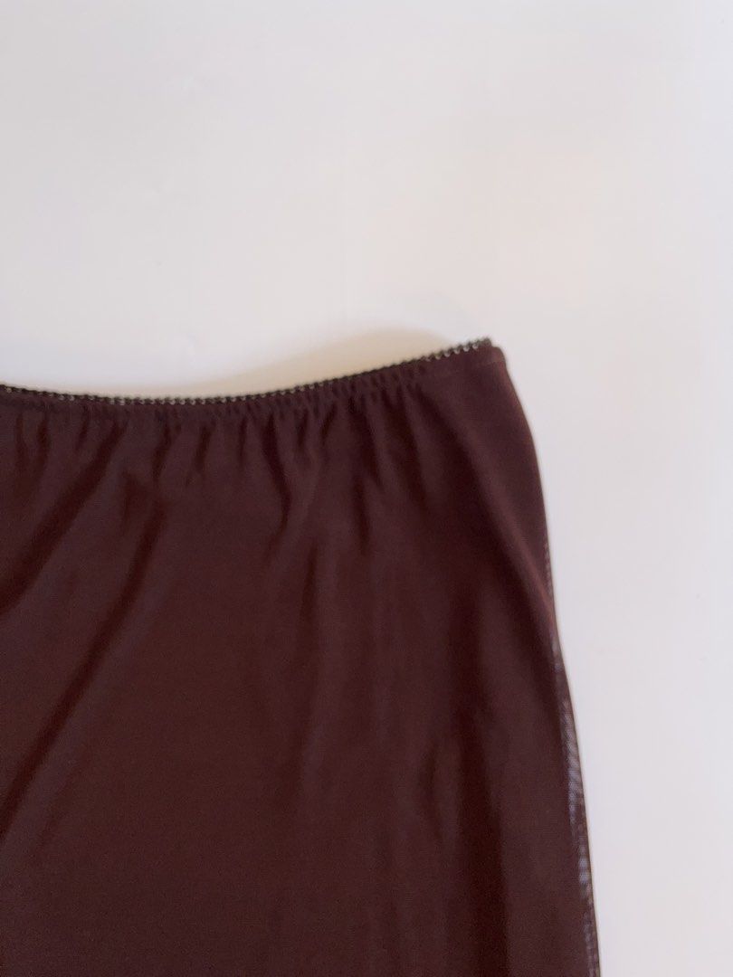 Chocolate Brown Mesh Asymmetrical Ruffle Midi Skirt (Category: Skirts) located in Lianga. Submitted by preyala (Listing ID 1465663397, Image 2). Description: Chocolate Brown Mesh Asymmetrical Ruffle Midi Skirt Size: M Waist: 28-30 Length: 33 Mine 399 Grab 429 Grabbing ends at 10:00 PM (today).