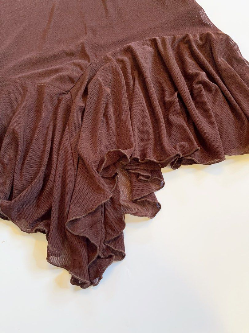 Chocolate Brown Mesh Asymmetrical Ruffle Midi Skirt (Category: Skirts) located in Lianga. Submitted by preyala (Listing ID 1465663397, Image 3). Description: Chocolate Brown Mesh Asymmetrical Ruffle Midi Skirt Size: M Waist: 28-30 Length: 33 Mine 399 Grab 429 Grabbing ends at 10:00 PM (today).